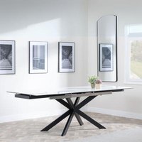 Product photograph of Sutton White Ceramic Extending Dining Table With Black Star Base from Choice Furniture Superstore