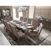 Product photograph of Modum Platinum Italian Silver Butterfly Extending Dining Set With Capitonne Nabuk Chairs from Choice Furniture Superstore