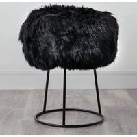 Product photograph of Bovril Sheepskin Stool With Black Metal Legs In Black from Furniture in Fashion
