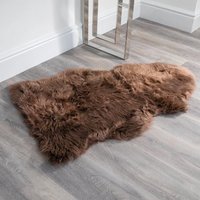Product photograph of Ladson Sheepskin Rug In Taupe from Furniture in Fashion