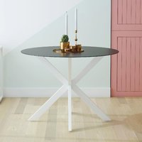 Product photograph of Modena Black Glass Dining Table With White Metal Frame from Furniture in Fashion