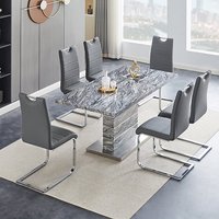 Product photograph of Parini Small Extending Melange Dining Table 6 Petra Grey Chairs from Furniture in Fashion