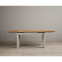 Product photograph of Extending Buxton 140cm Oak And Soft White Painted Dining Table from Oak Furniture Superstore