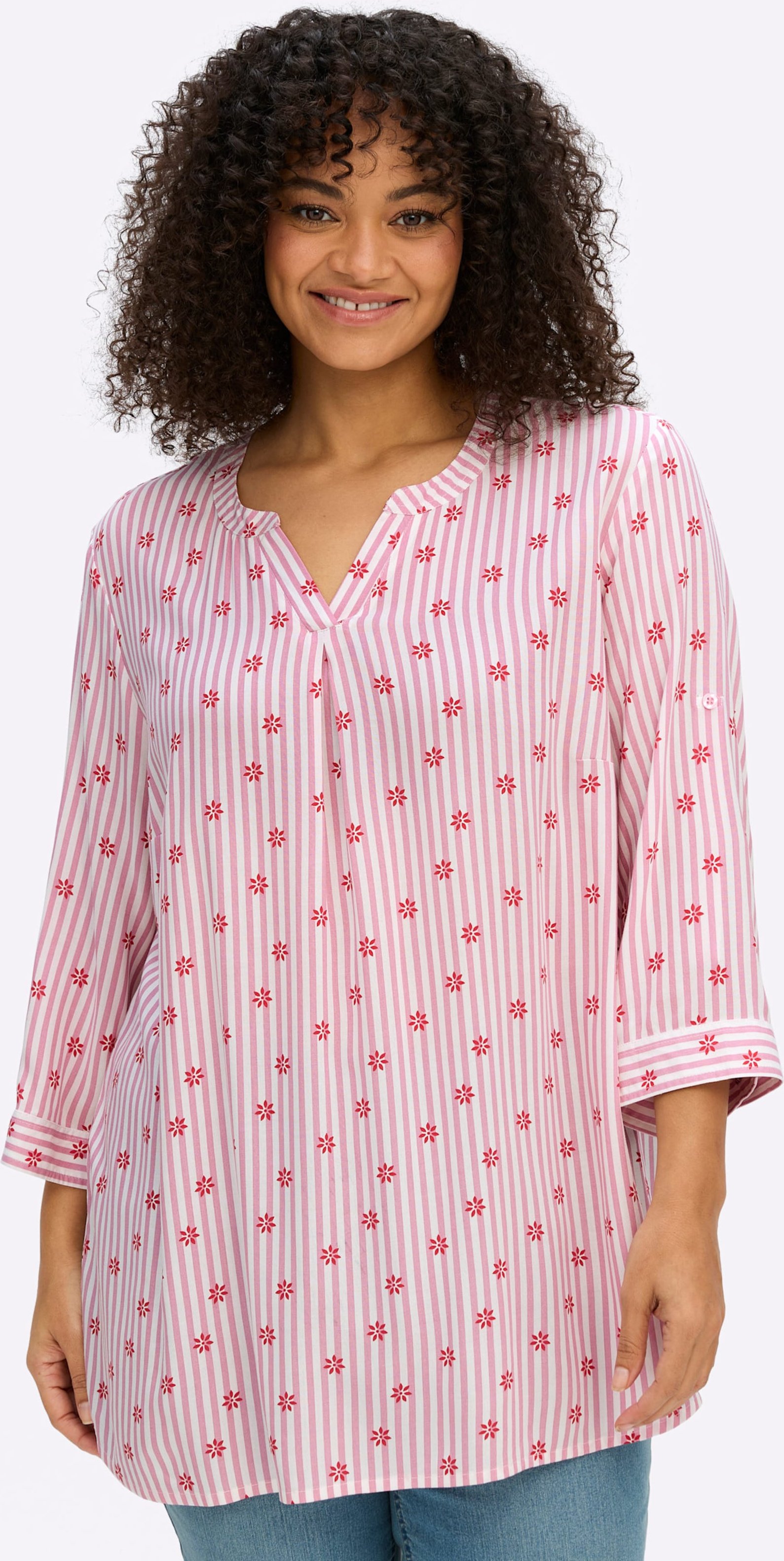 Sheego Tunika im Mustermix aus Streifen und Blüten