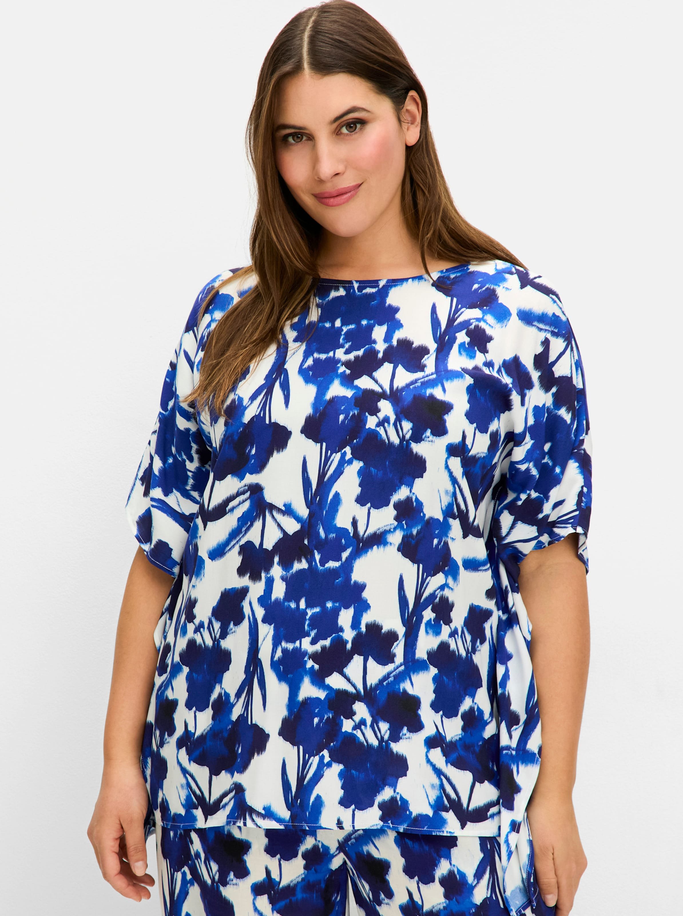 Sheego Tunika mit Zipfelsaum und Blumendruck