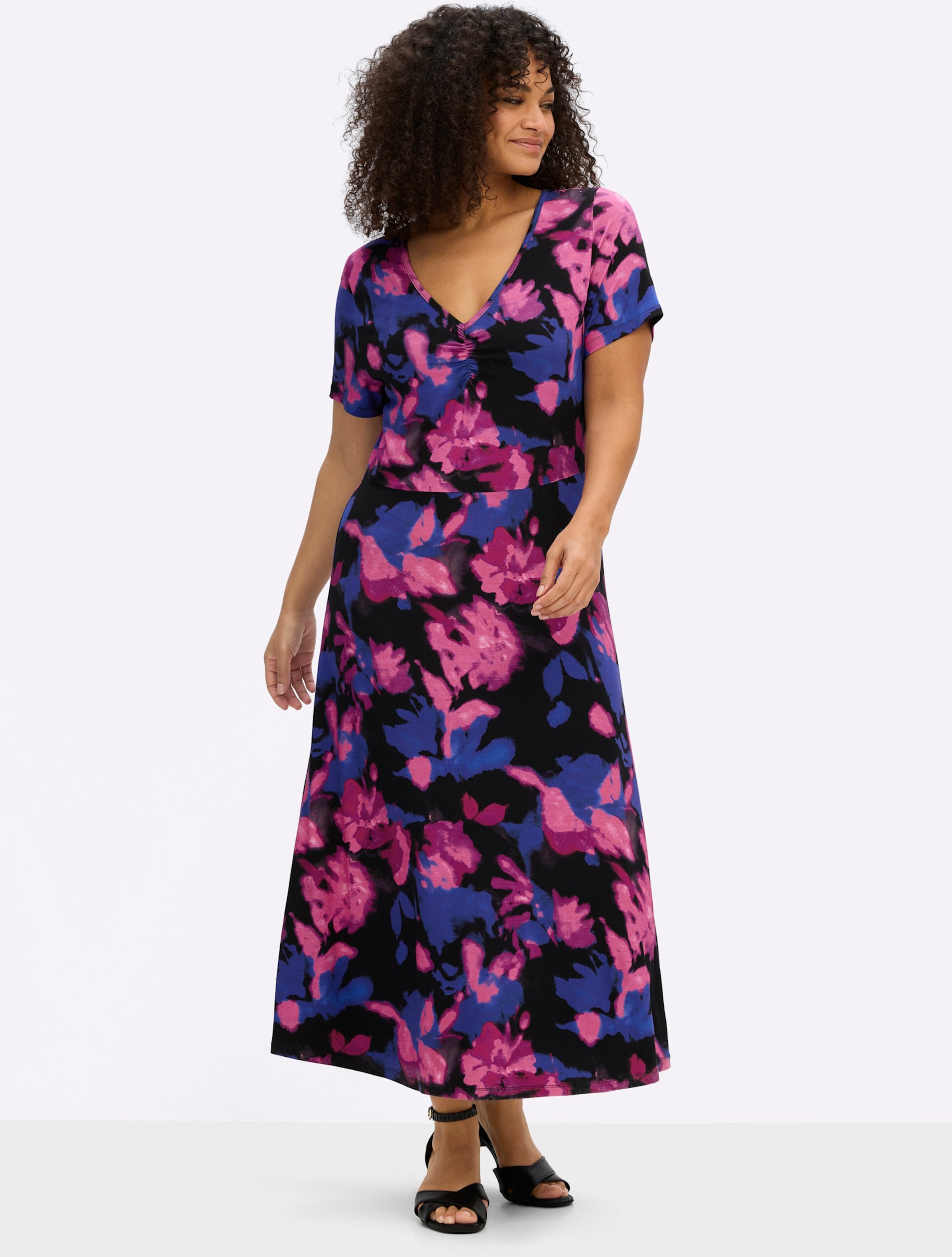 Sheego Jerseykleid mit leuchtendem Blumenmuster