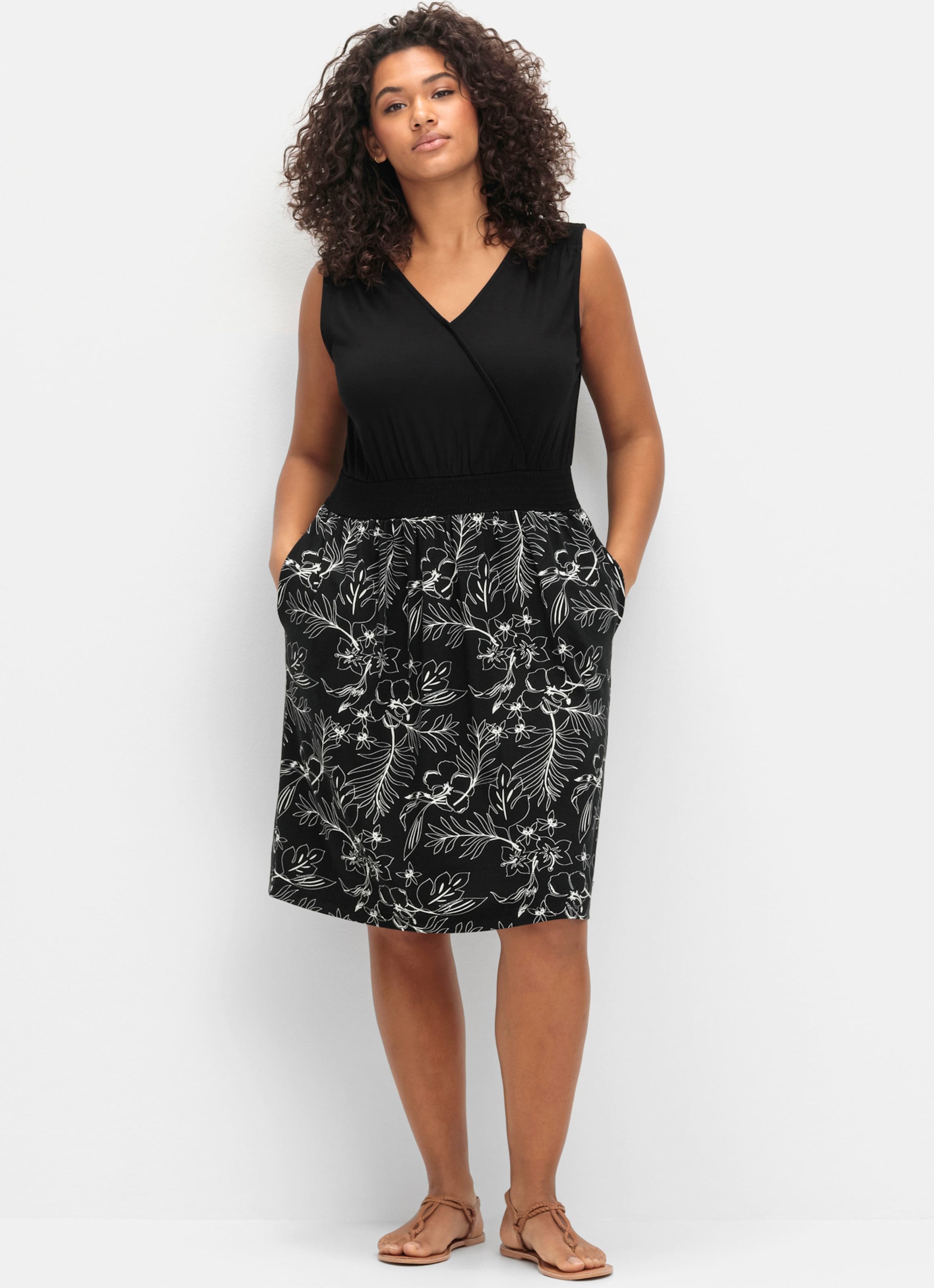 Sheego Jerseykleid mit bedrucktem Rock