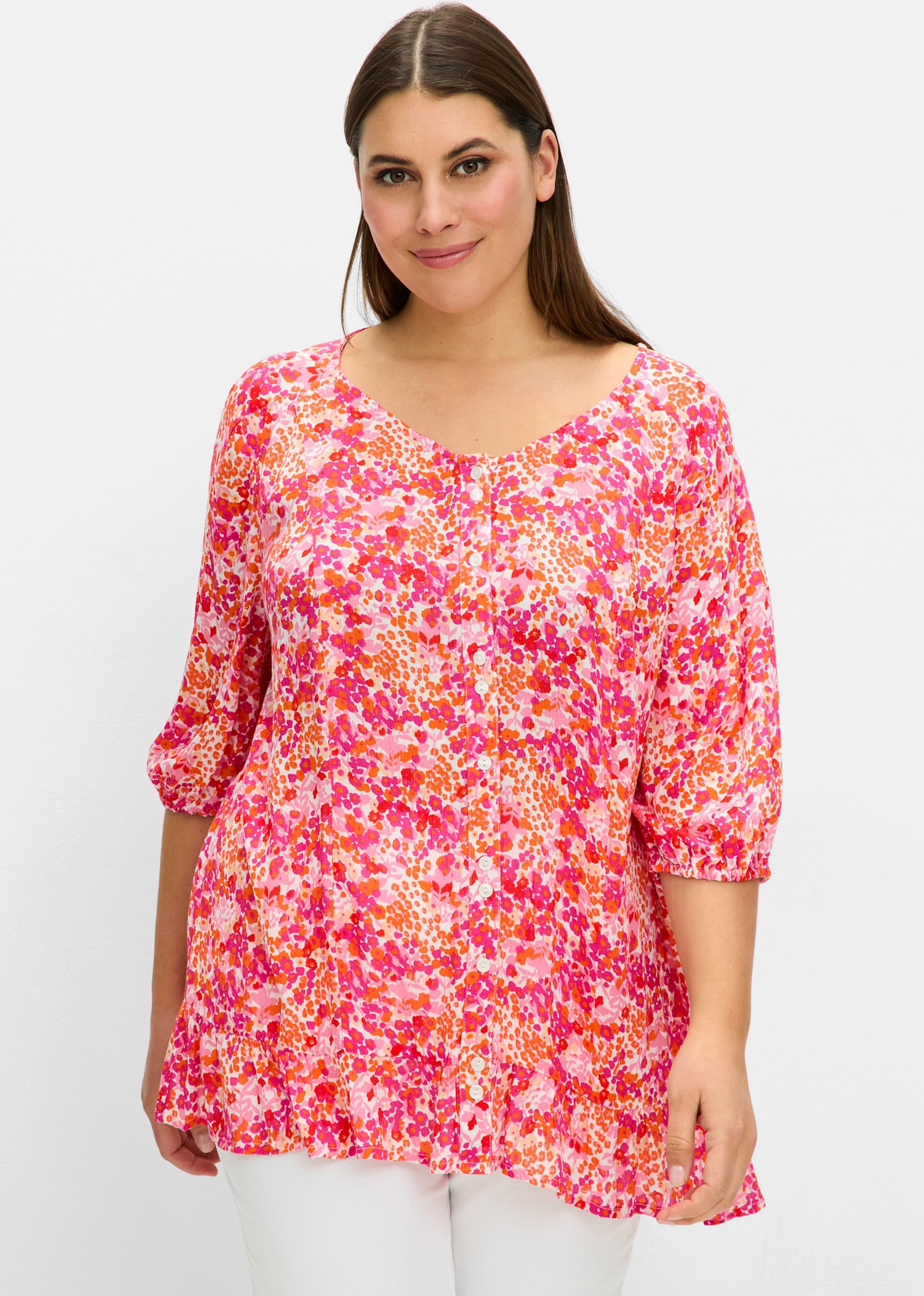 Sheego Druckbluse in Crêpe-Qualität, mit Volant am Saum