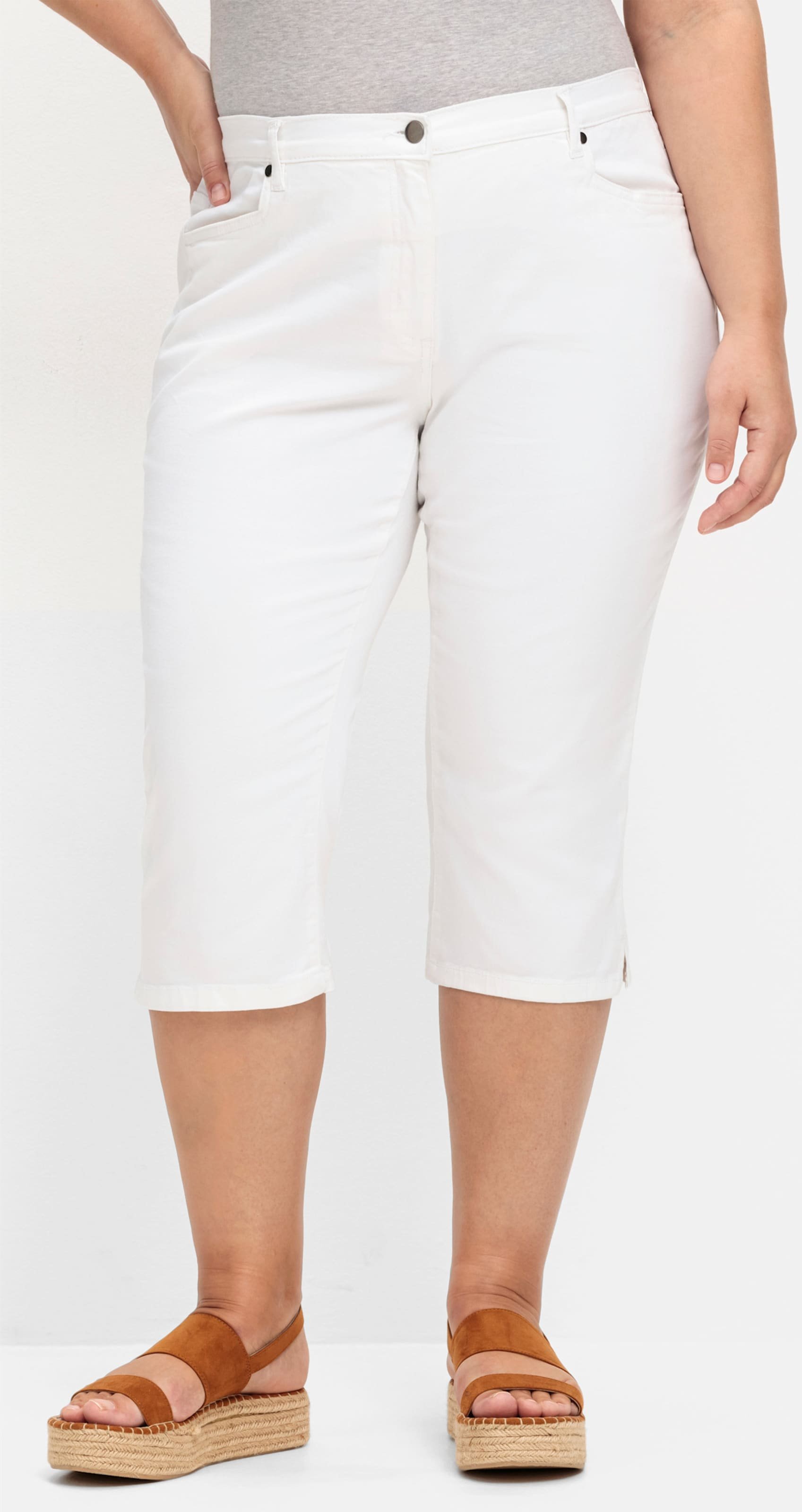 Sheego Caprijeans mit glitzerndem Katzenmotiv