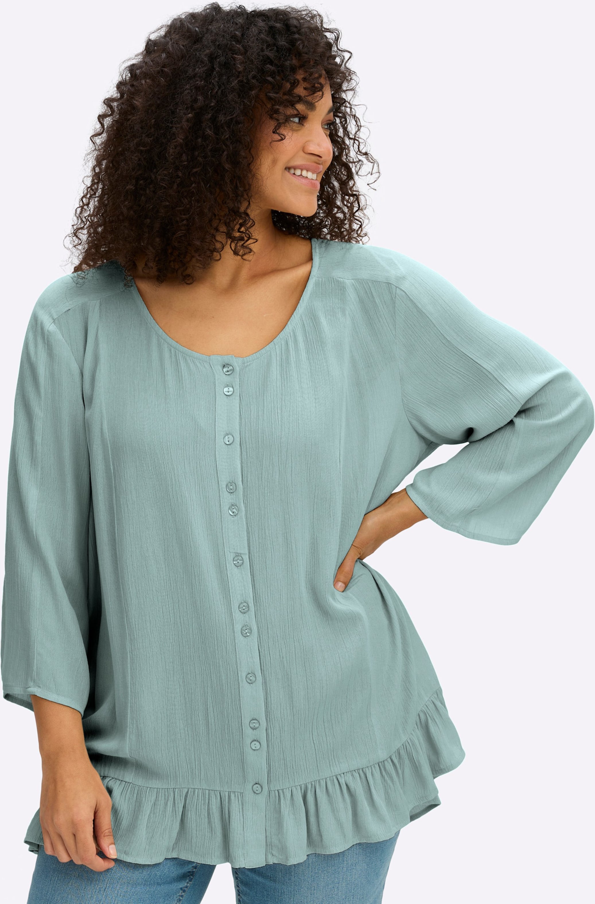 Sheego Crinklebluse mit Volant am Saum