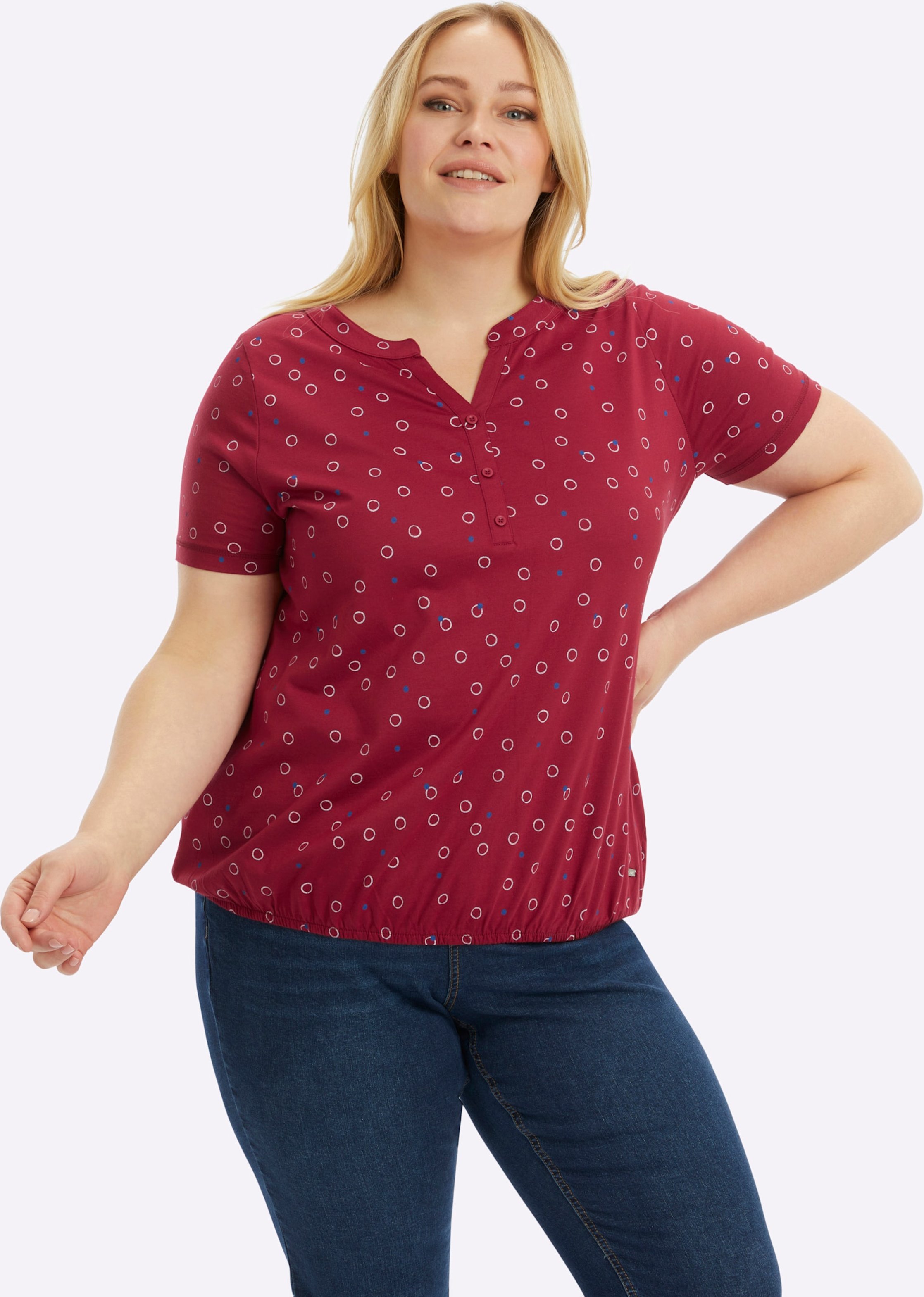 Sheego Print-Shirt mit elastischem Saum
