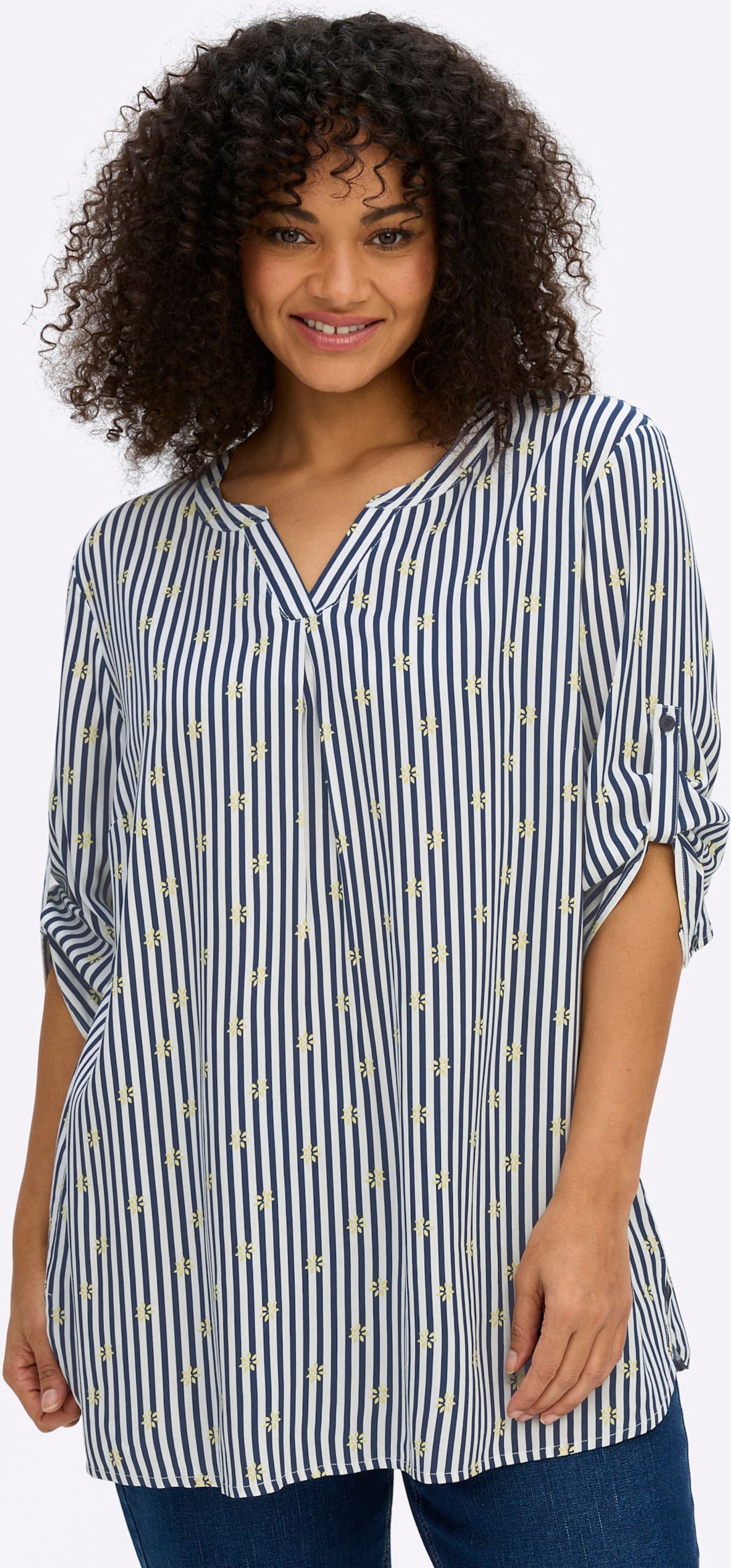 Sheego Tunika im Mustermix aus Streifen und Blüten