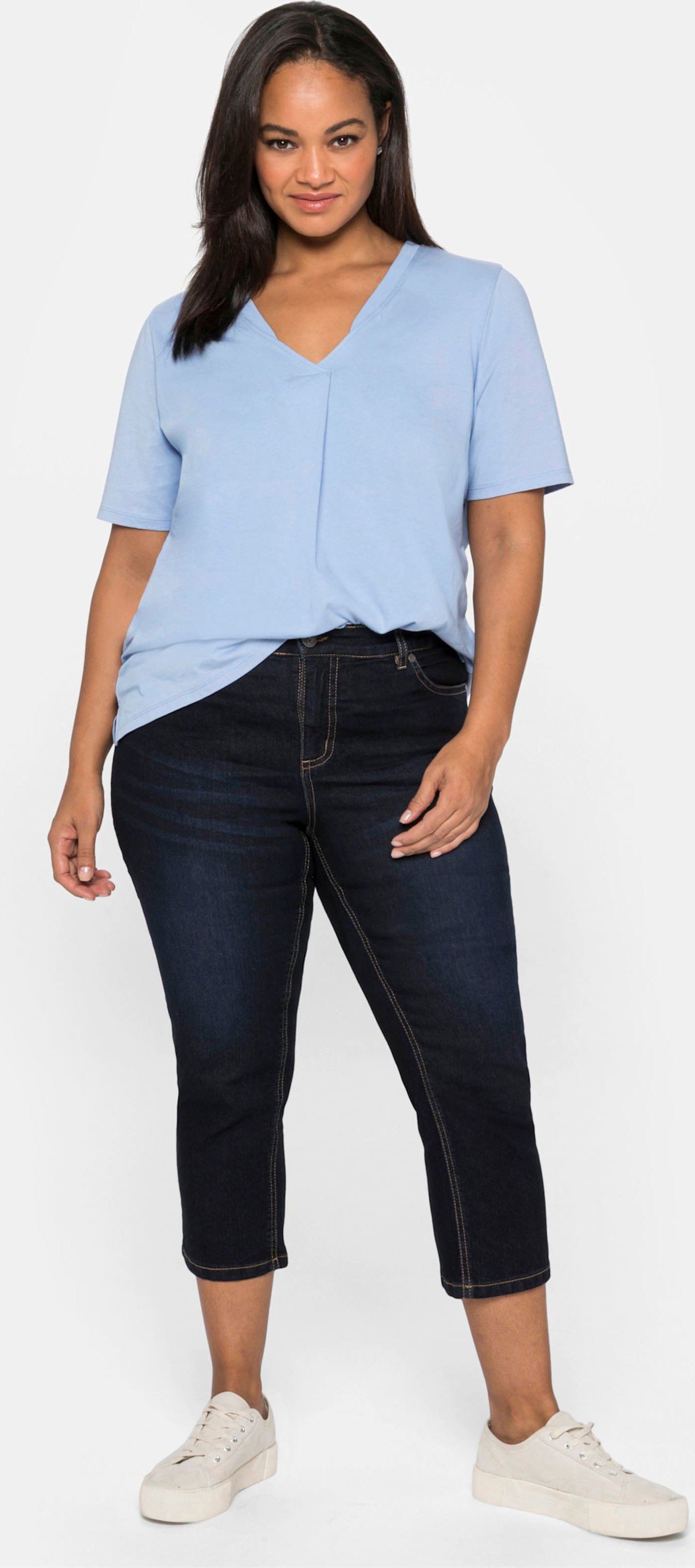 Sheego Caprijeans mit Kontrastnähten und Catfaces