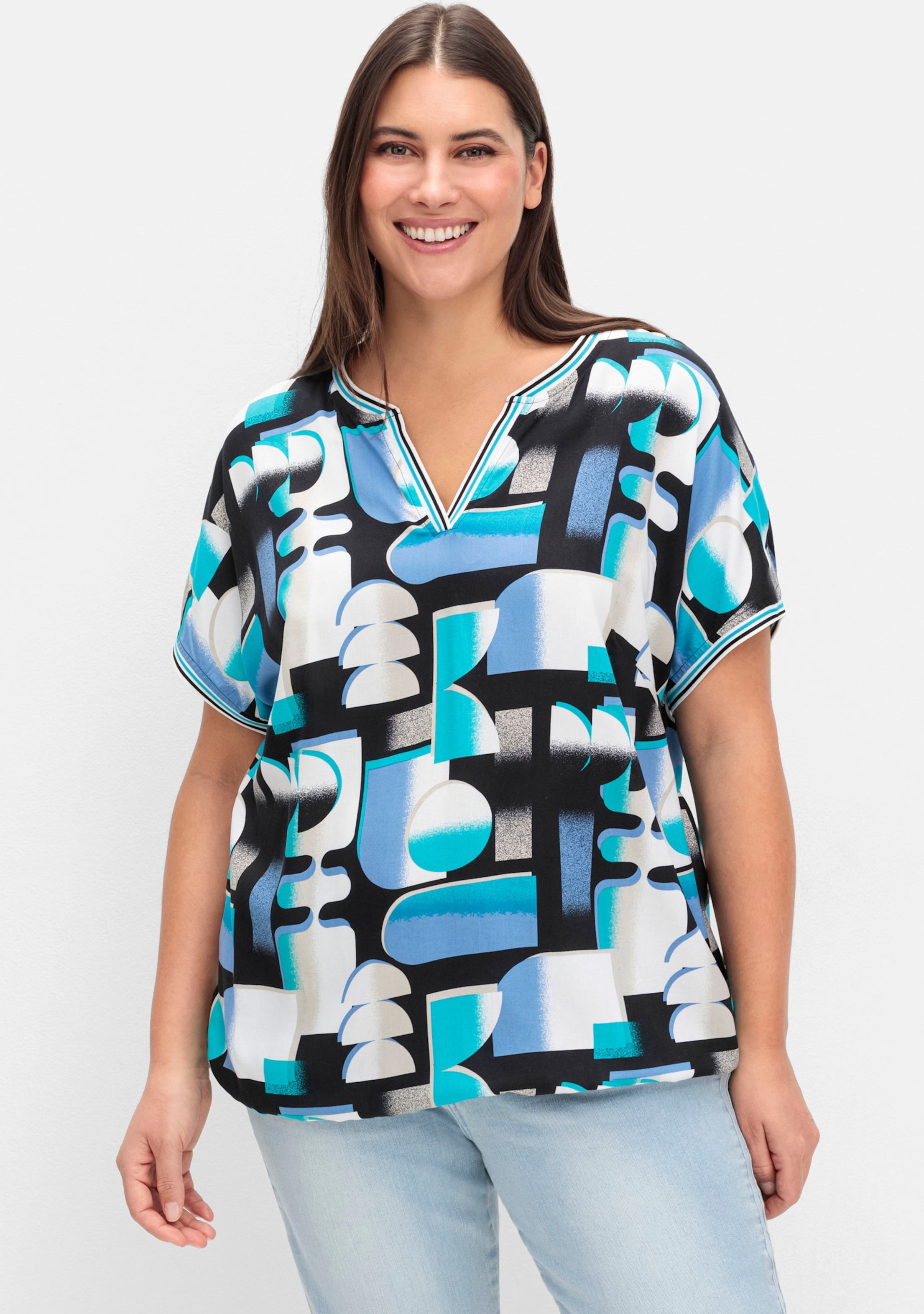 Sheego Druckbluse mit gestreiften Bündchen