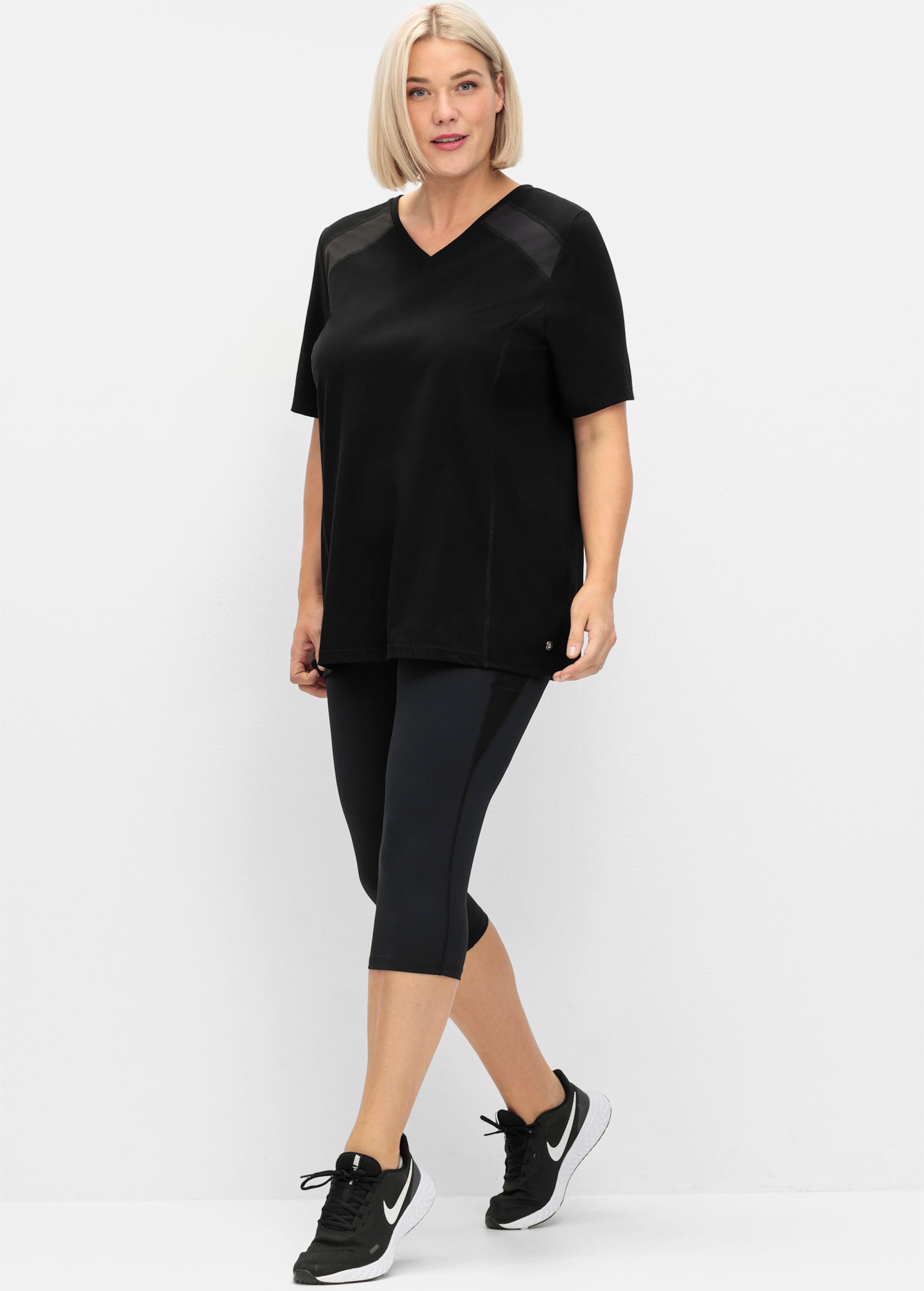 Sheego Leggings in Funktionsqualität und Caprilänge,