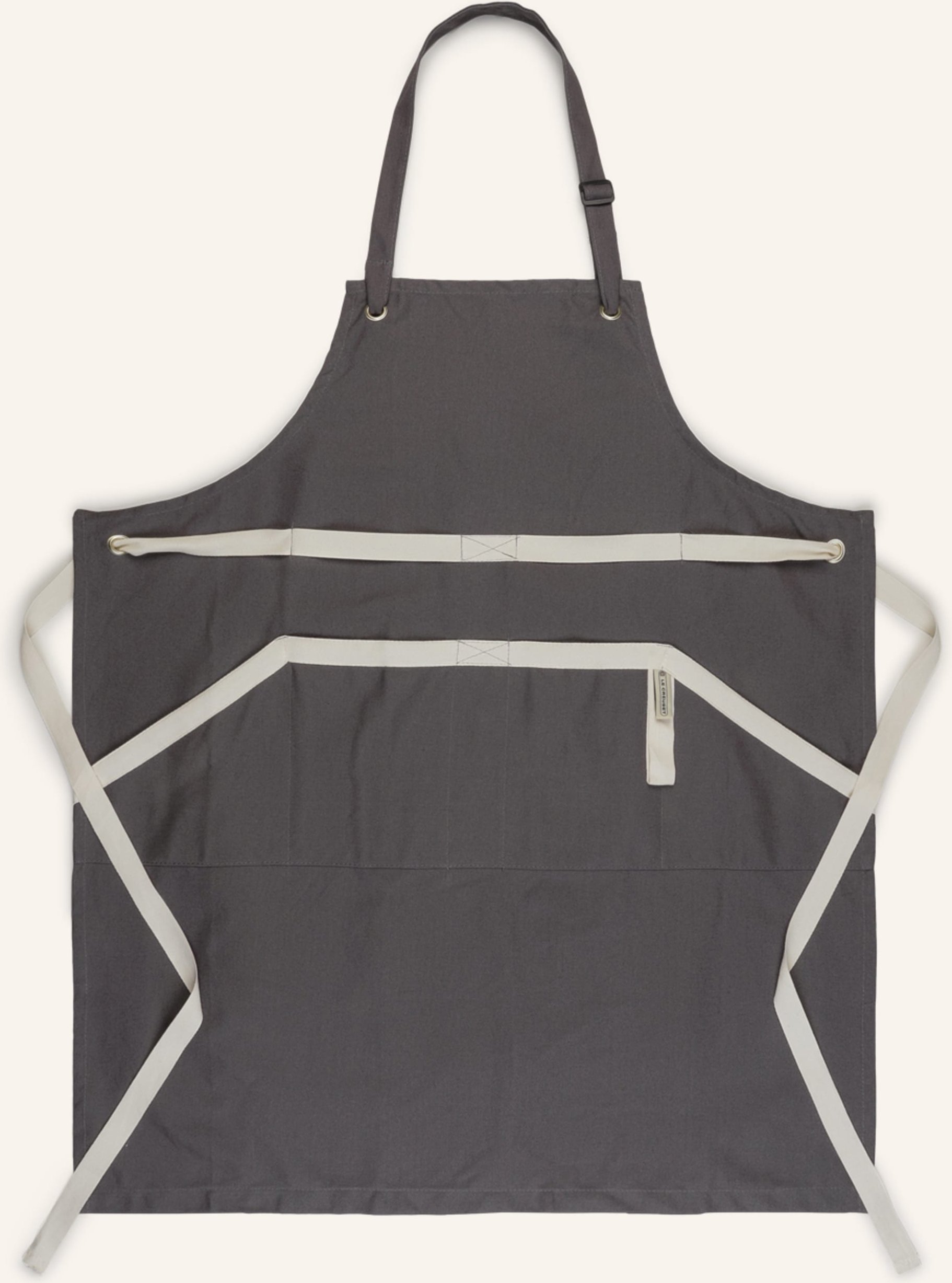 Le Creuset Schürze grau