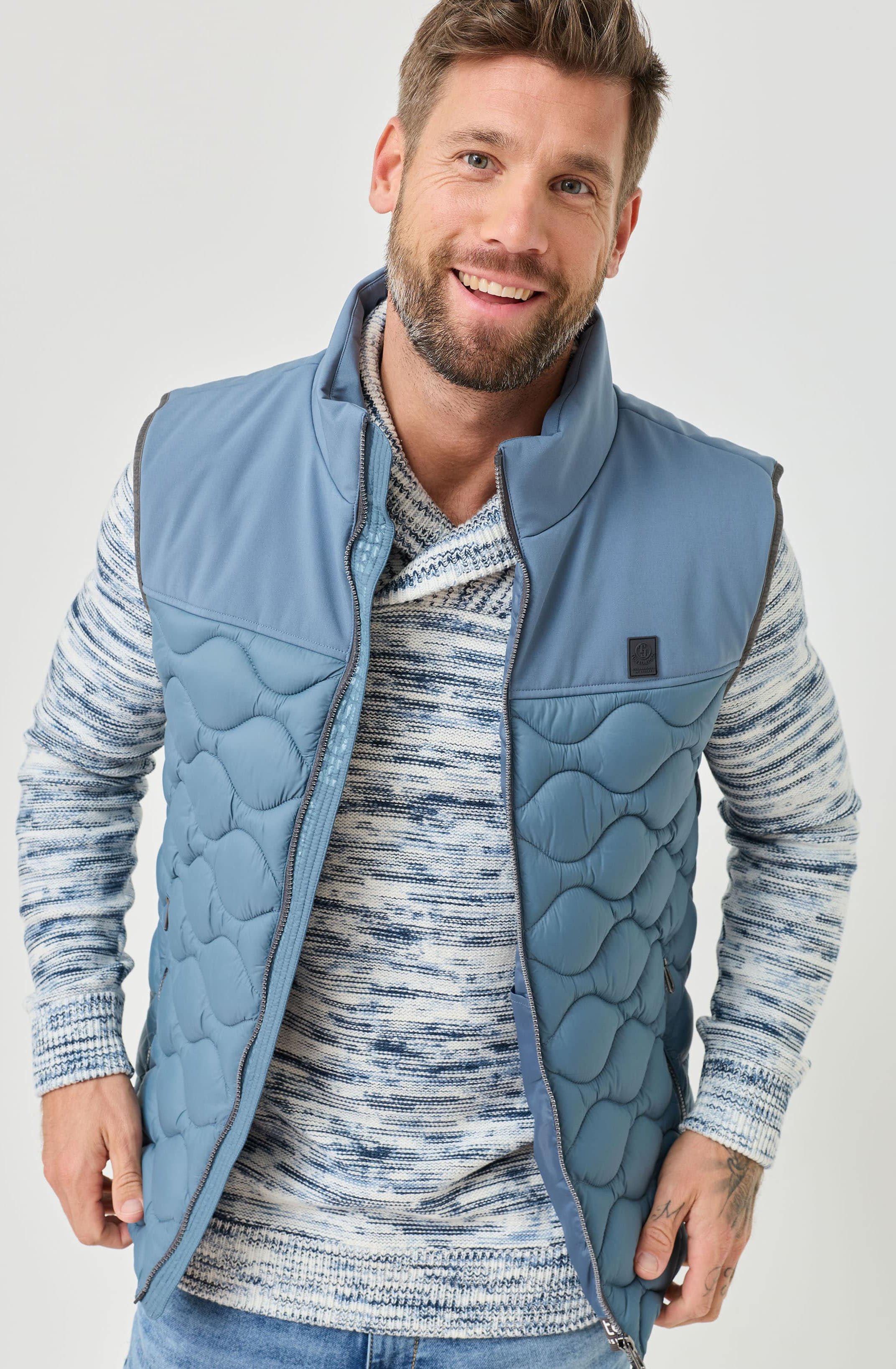 Steppweste im Materialmix