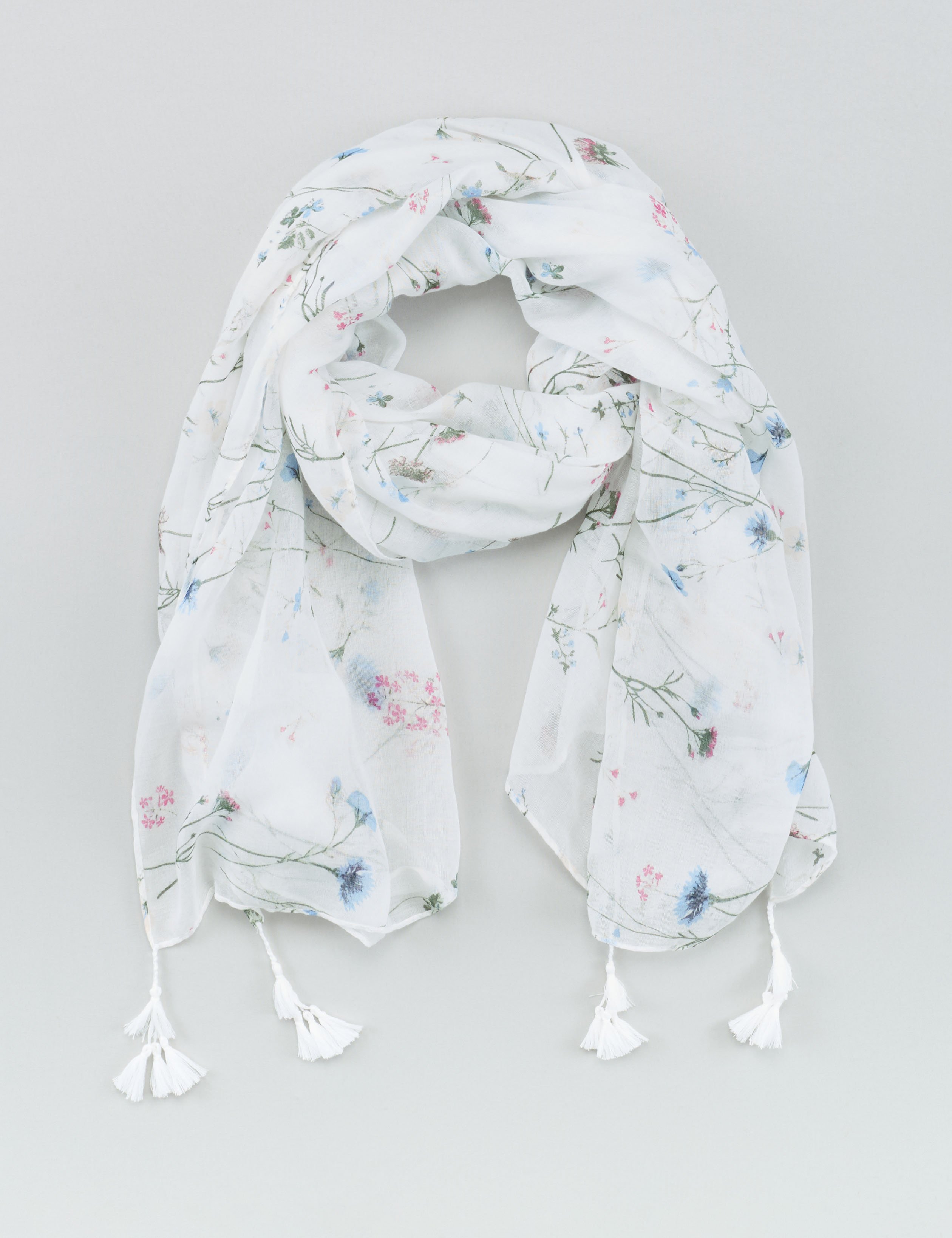 Zart bedrucktes Tuch mit Quasten