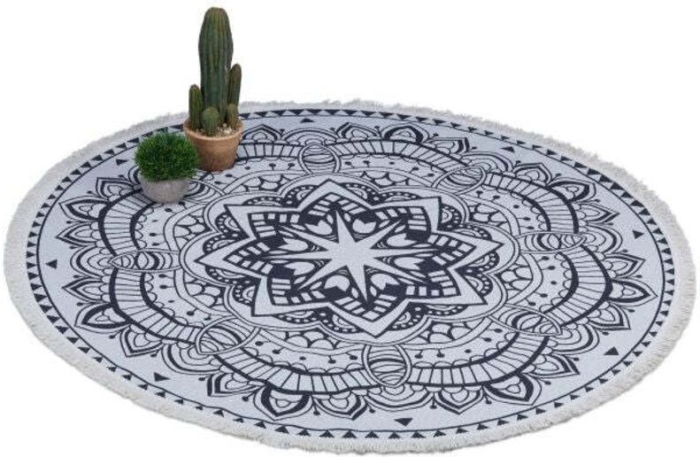 Round carpet with mandala design