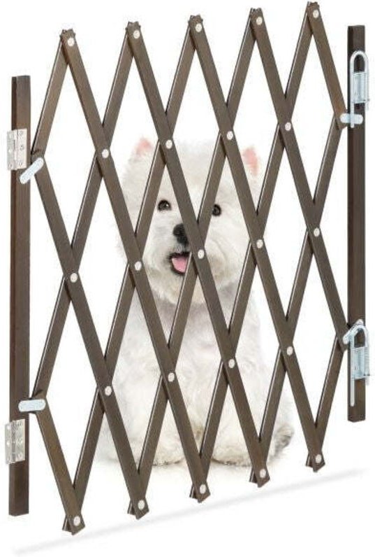 Extendable dog barrier in brown