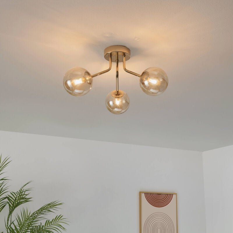 Kosilum - Goldene Deckenleuchte mit 3 bernsteinfarbenen Glaskugeln - Ottavia