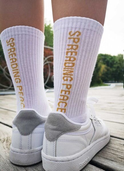 SPARKLES OF LIGHT SPREADING PEACE Unisex Sportsocken aus Biobaumwolle