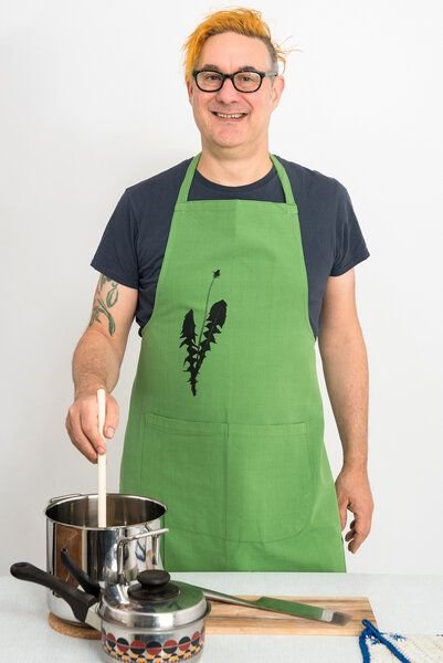 Hirschkind Fair-Trade & Bio-Kochschürze handgewebt grün "Löwenzahn"