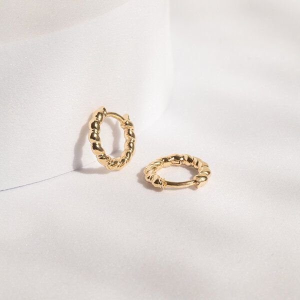 Eppi Runde geflochtene Ohrringe aus Silber Torcy