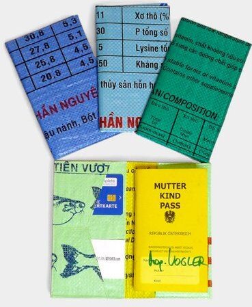 REFISHED fair fashion Reisepasshülle 'WANDERLUST' - upcycelte Fischfuttersäcke