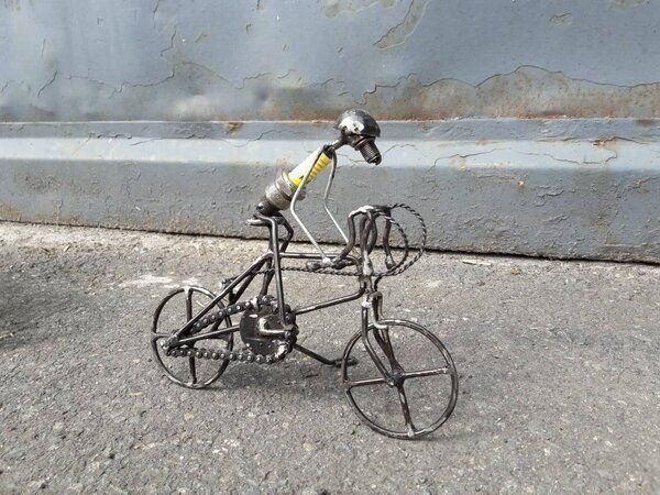 Moogoo Creative Africa Zündkerzen Figur - Radfahrer:in