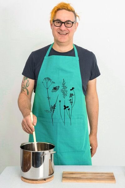 Hirschkind Bio-Kochschürze handgewebt Fair-Trade "Schmetterlingswiese" türkis