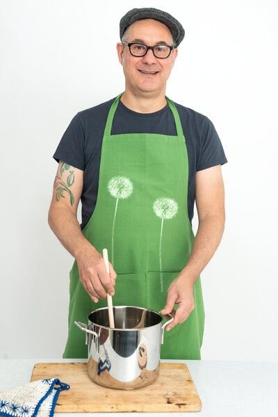 Hirschkind Fair-Trade & Bio-Kochschürze handgewebt grün "Pusteblumen"