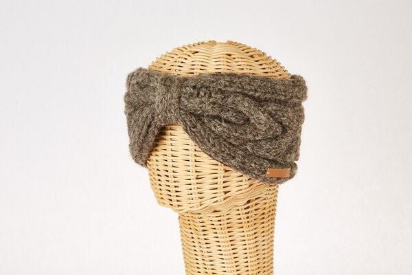 short'n'pietz Schurwollstirnband mit Zopfmuster und Knoten, handgestrickt