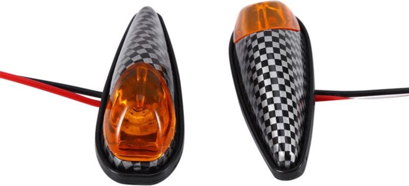 Hochleistungs-Motorradblinker mit Katzenaugen-LED-Schlangenform und gelbem Licht.