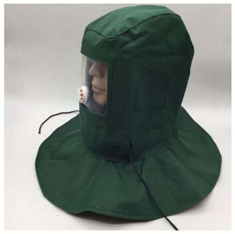 Casco protector a prueba de viento y polvo para máquina de chorro de arena.