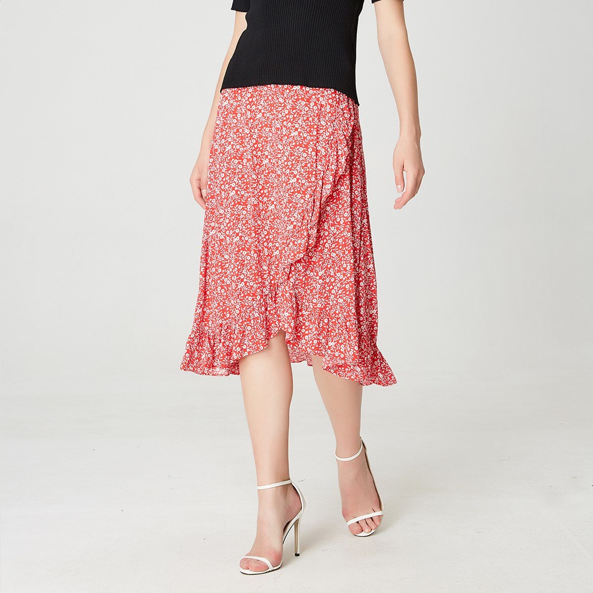 Kreuzrüschen und Rock mit Blumendruck