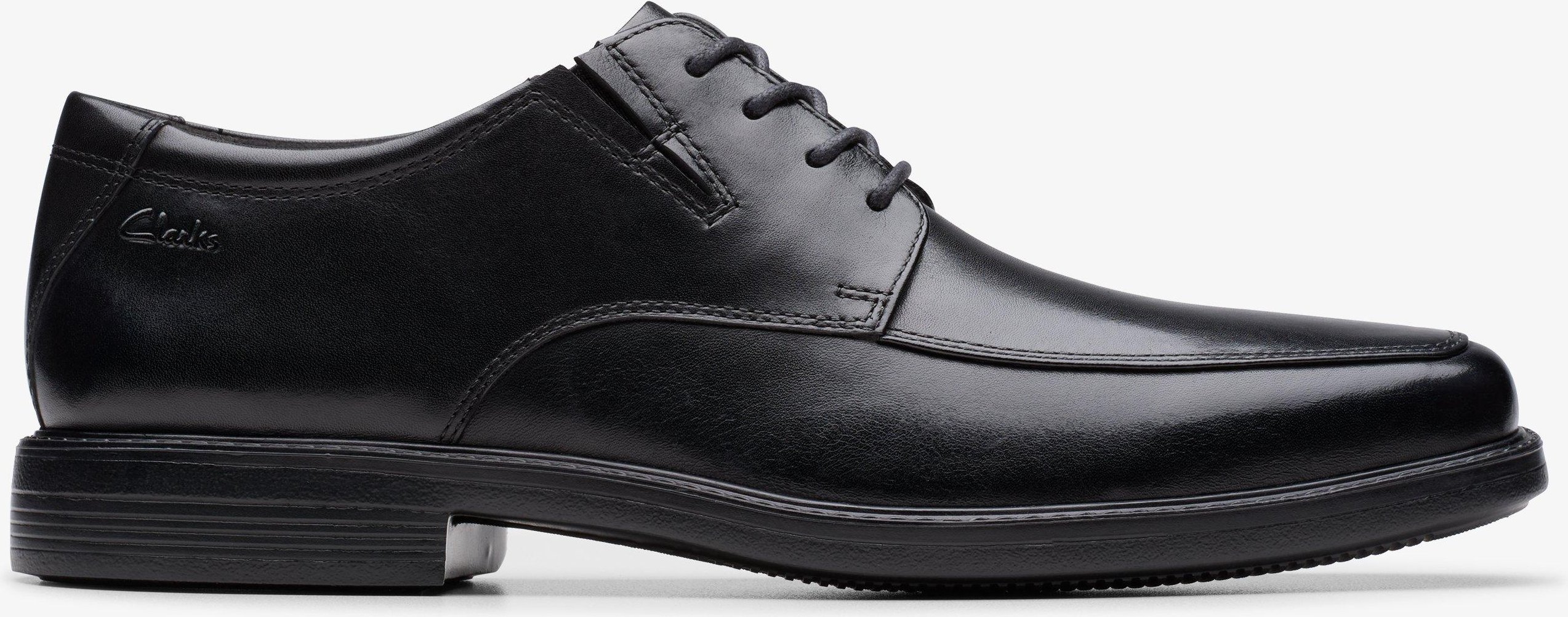 Cosgrove Schürze Schwarze Lederschuhe