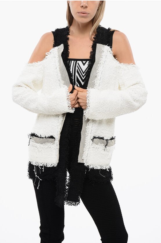 Tweed-Blazer mit schulterfreien Schnitten und kontrastierenden Säumen in Schwarz und Weiß