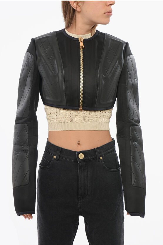 Kurze Jacke aus technischem Gewebe mit goldenem Reißverschluss in Schwarz