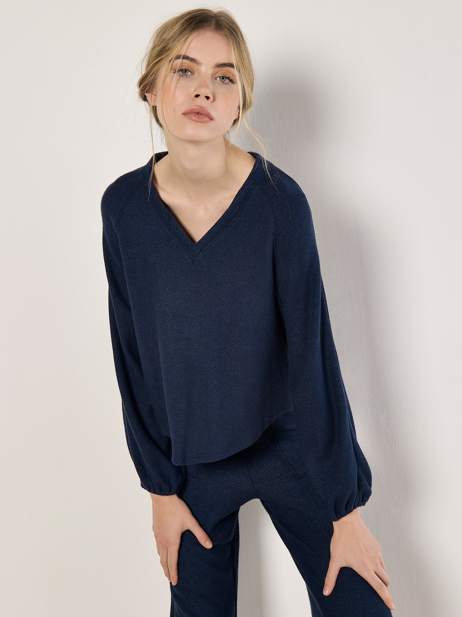 Apricot Texturiertes Oberteil mit V-Ausschnitt