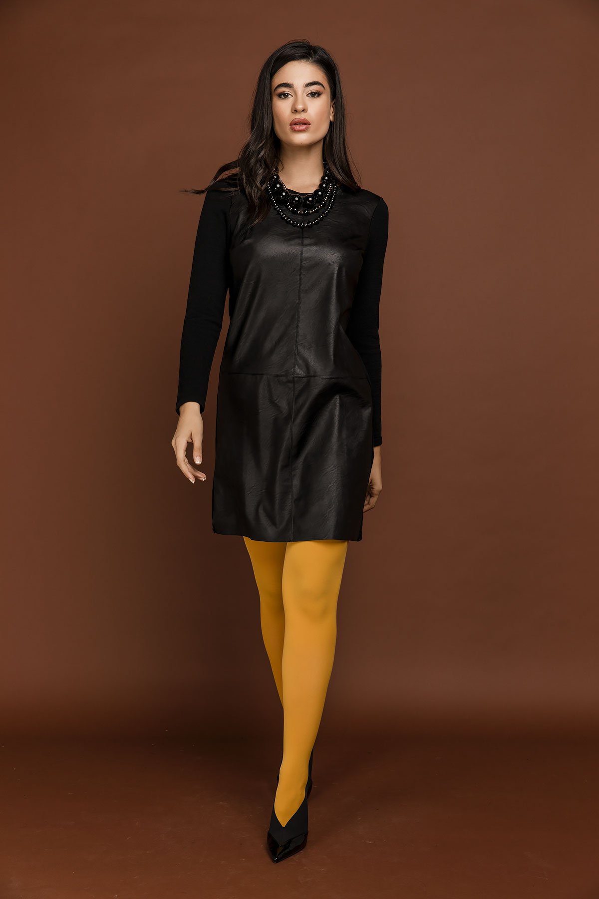 Schwarzes Kleid mit Kunstledereinsatz von Si Fashion