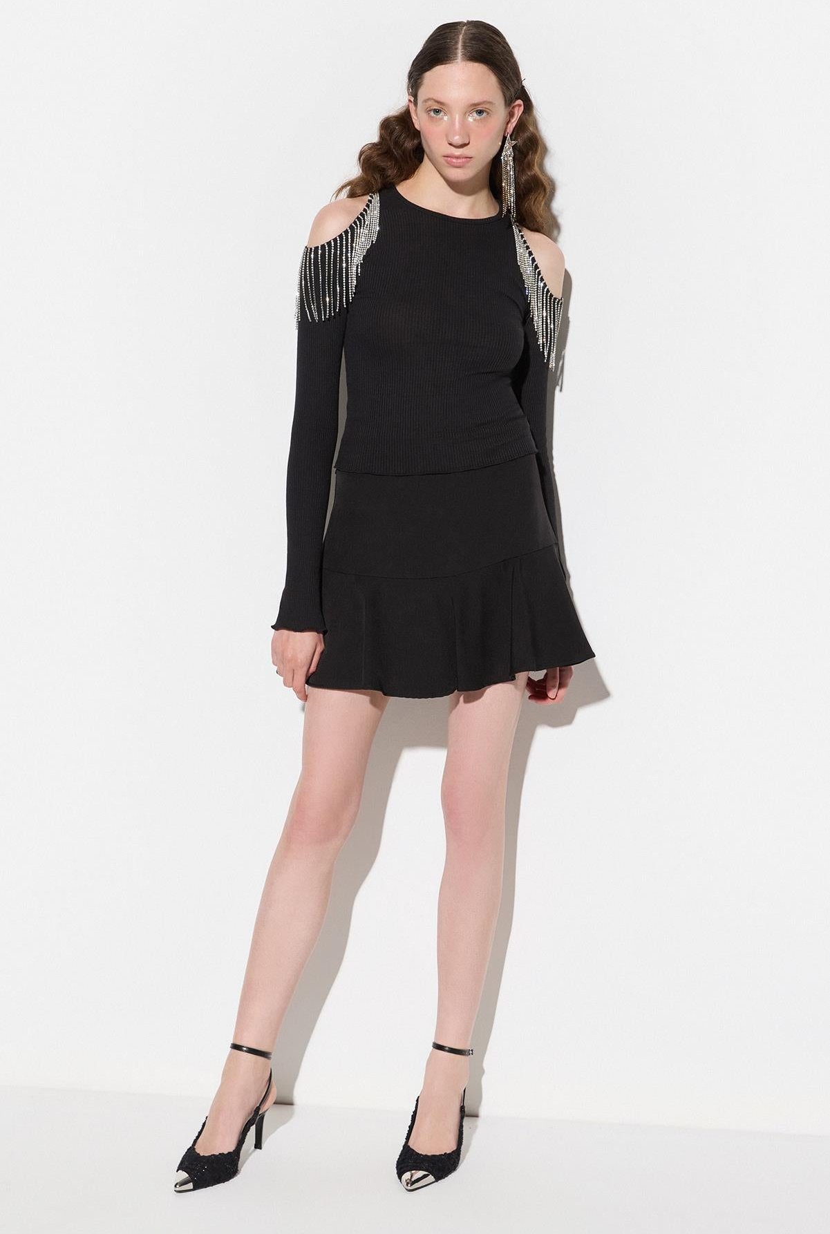 Glänzende Bluse mit Fransen