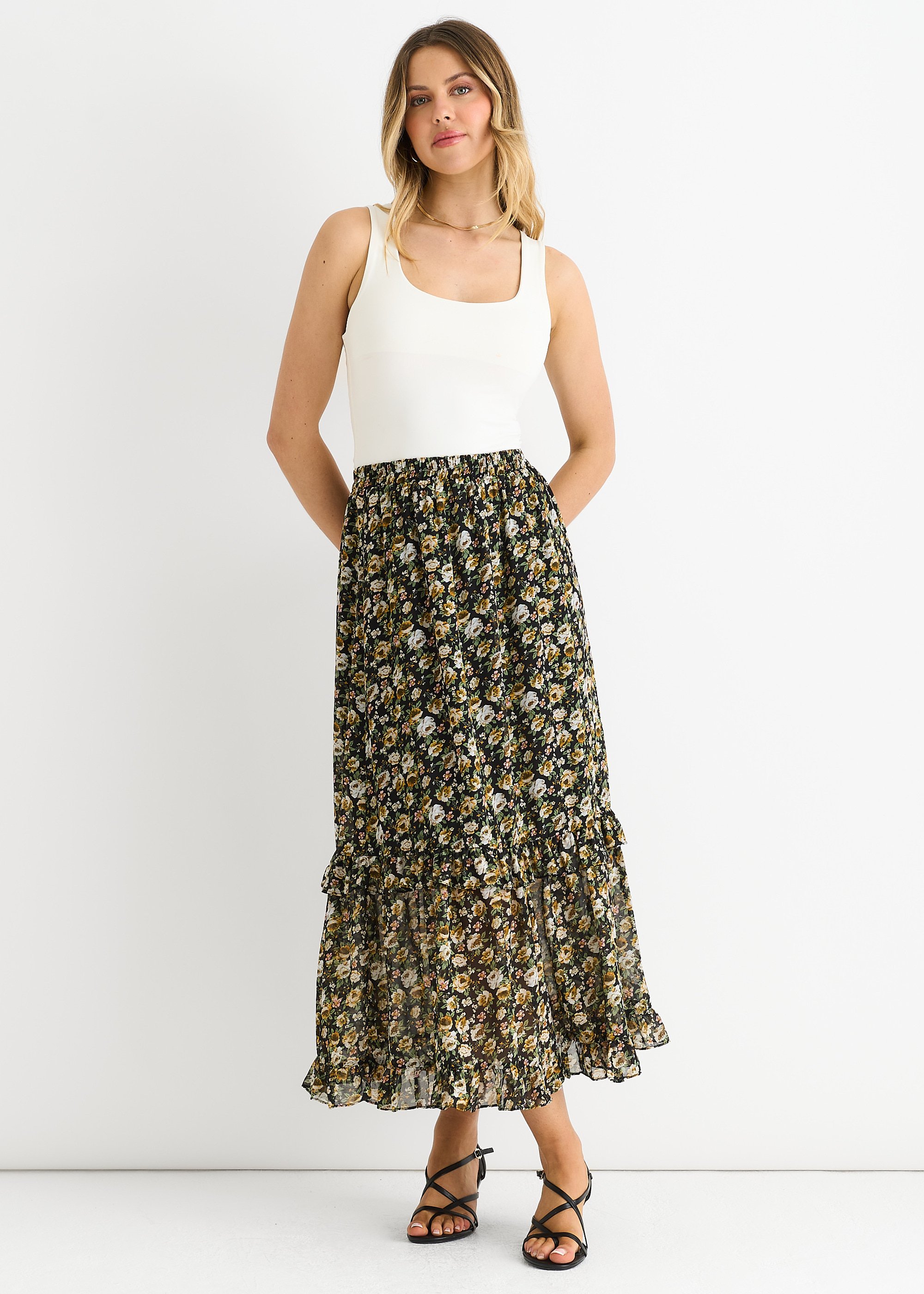 Schwarzer glitzernder geblümter Maxirock