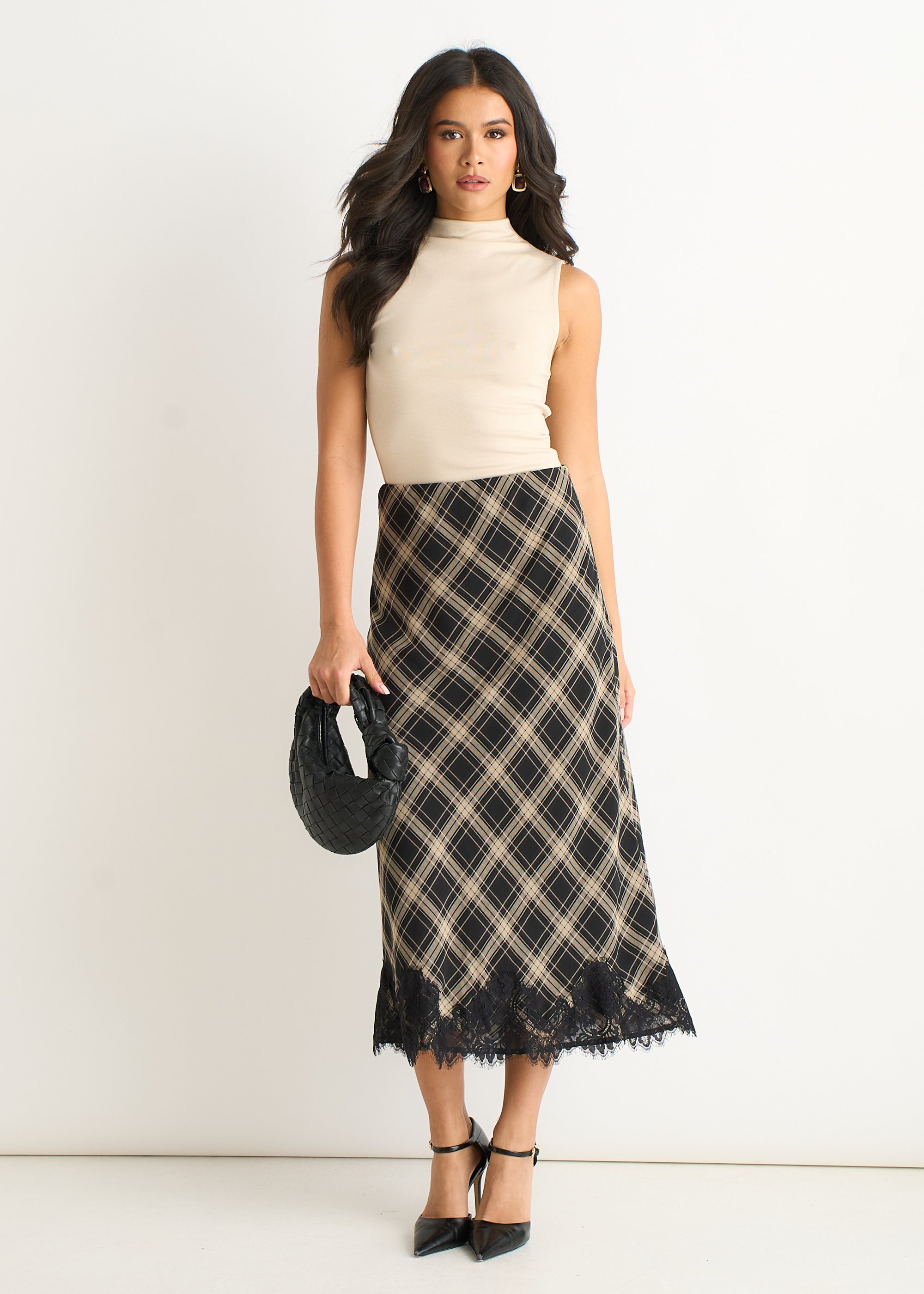 Monokarierter Rock mit kontrastierender Spitze und Schrägband