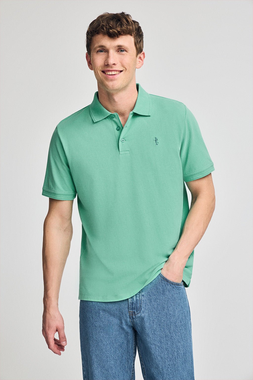 Kurzärmliges Poloshirt aus Baumwollpiqué aquamarin mit Rigby Best Stickerei