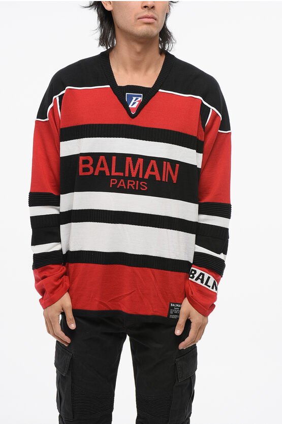 Pullover aus Schurwolle mit V-Ausschnitt in Rosso, Bianco und Nero