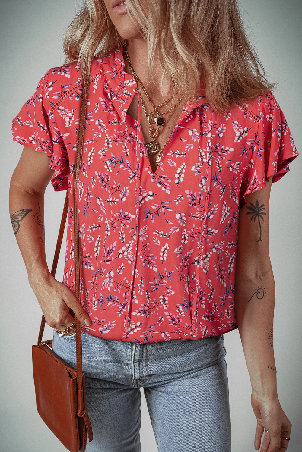 Bluse mit floralen Druck und Fledermausärmeln