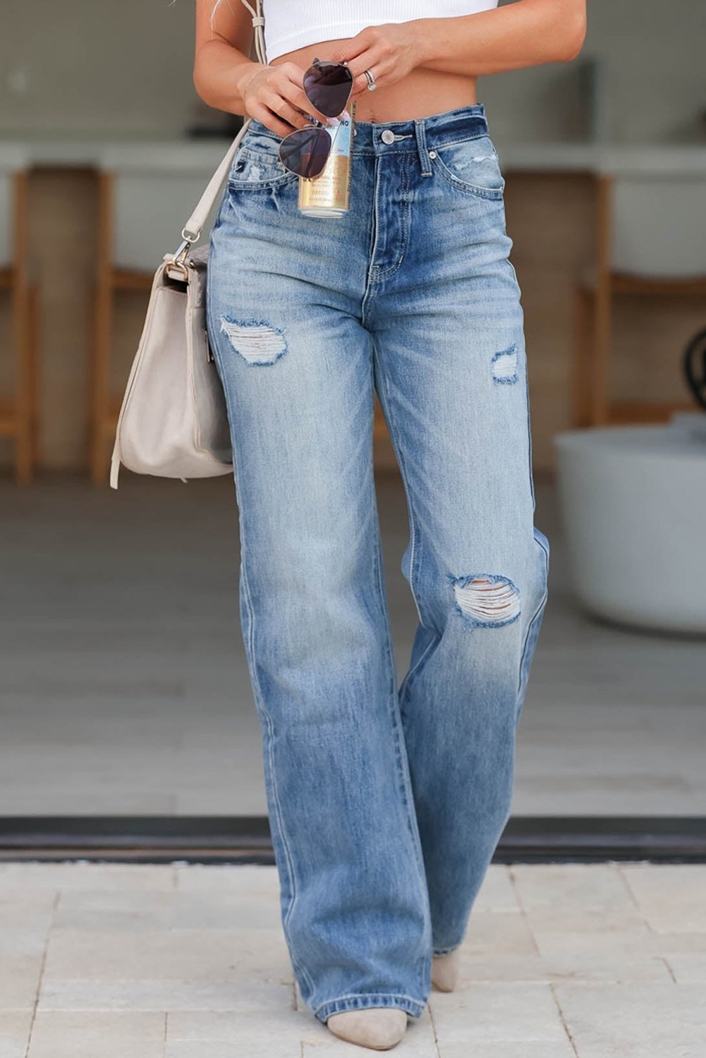 Hellblau hoch geschnittene distressed gerade Jeans