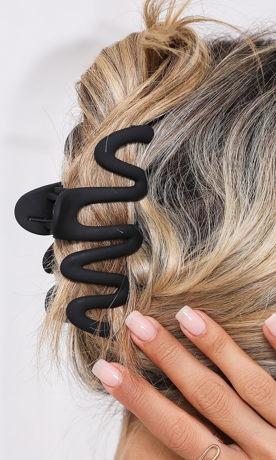 Wellenförmige Haarklammer