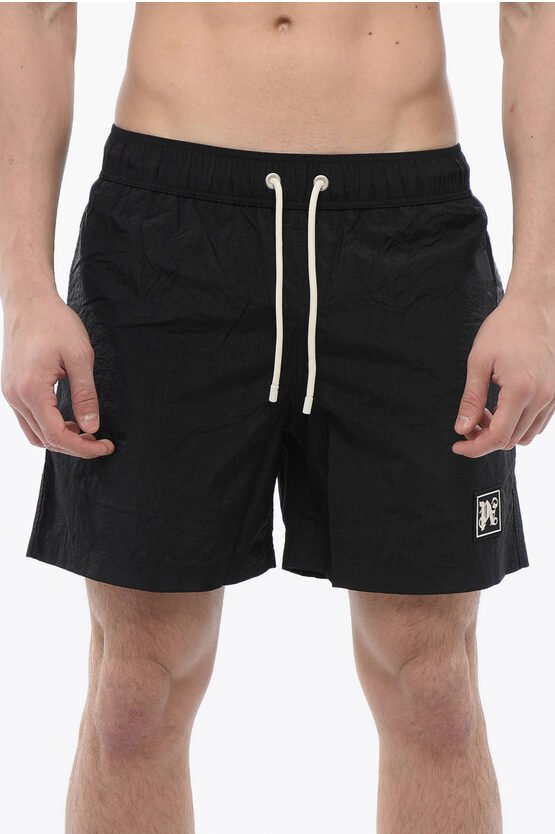 Badeshorts mit Kordelzug in Schwarz